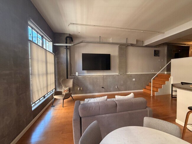 Building Photo - Industrial-Chic Loft in East Village | 1,049 Sq Ft | Gym & Rooftop