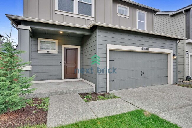 Foto del edificio - Modern 4-Bedroom Home in Rainier Ridge
