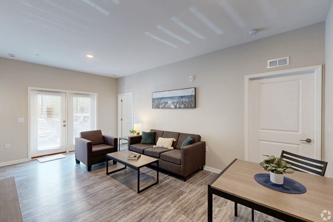 Seahawk Cove- Living Room - Seahawk Cove Apartments