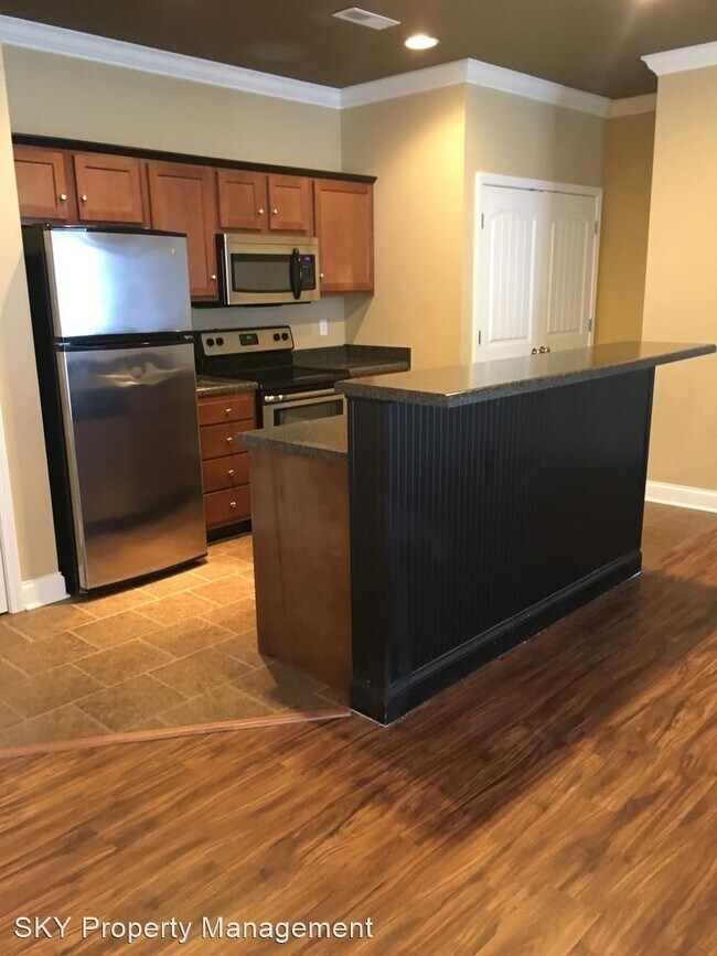 Building Photo - 1 br, 1 bath Apartment - Village at Tradit...