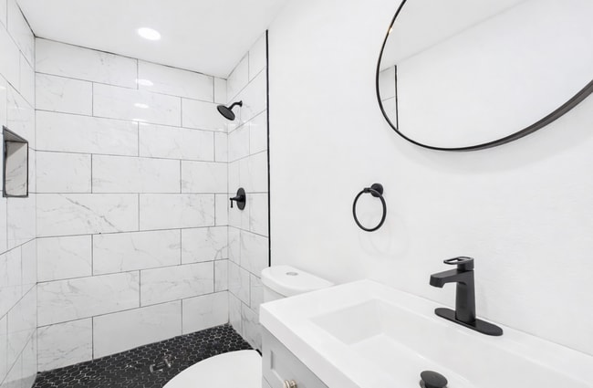 Building Photo - Stylishly Updated 4BR/3BA with Expansive Back Deck