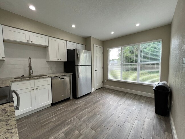Building Photo - Charming 4BR/2BA Single Family Home in Orlando!!