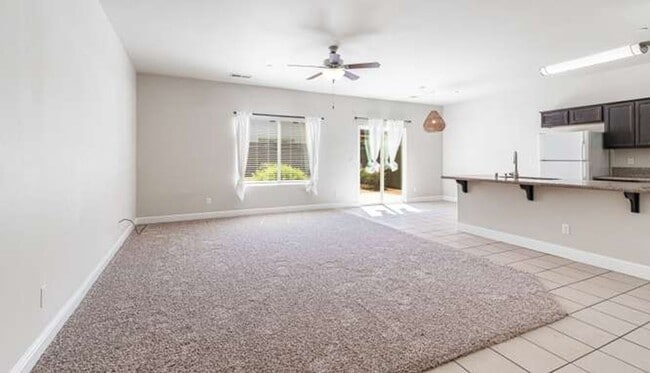 Building Photo - Four bedroom/2-bath home with 2-car garage