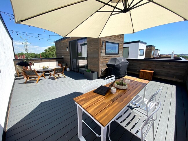 Photo - Modern 2BR + Office Townhome with Rooftop Deck in Prime Sunnyside/Highlands Location