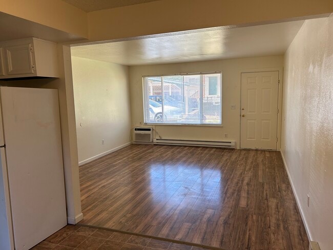 Salas de estar con aire acondicionado - Quail Ridge Apartments