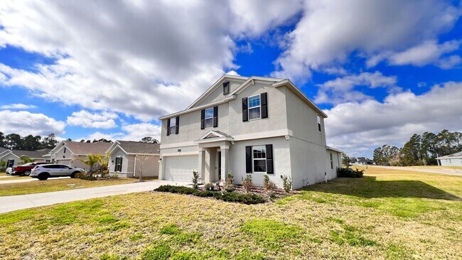 Foto del edificio - Elegant & Spacious 4-Bedroom Home with Bon...