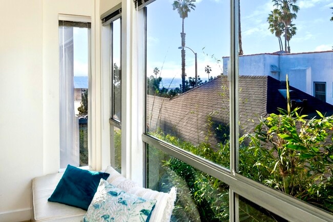 Peaceful side ocean view framed by palms and bamboo - 2221 Ocean Ave
