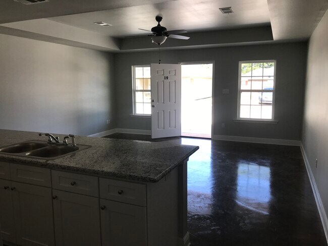 Stained Concrete Flooring - 13496 E Adams Rd