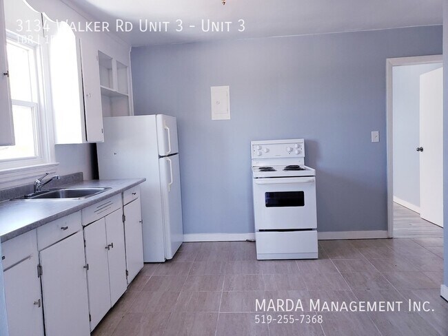 Photo du bâtiment - SPACIOUS 1 BED/1 BATH UNIT ON WALKER! + HYDRO