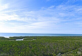 Building Photo - 6001 Pelican Bay Blvd