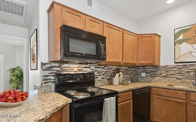 Building Photo - 9259 E Raintree Dr
