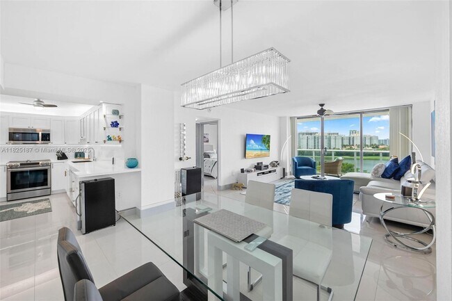 Building Photo - 3675 N Country Club Dr