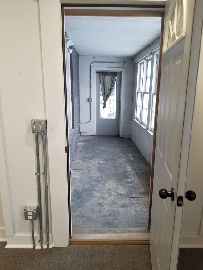 Enclosed side porch - 439 W Washington St
