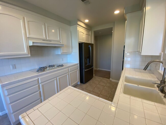 Building Photo - EVERGREEN - Beautiful condominium located ...