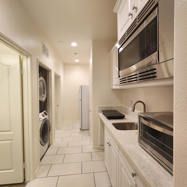 Hallway with Samsung washer and dryer - 30134 Big Country Dr