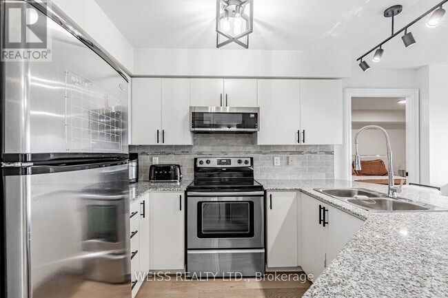 Photo du bâtiment - 872 Sheppard Ave W