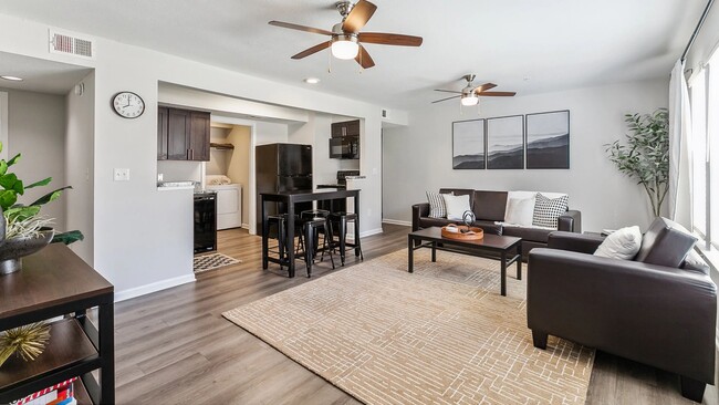 Our vibrant living rooms are equipped with two ceiling fans that keep the vibes cool and study sessions lit! - MAISON Burbank