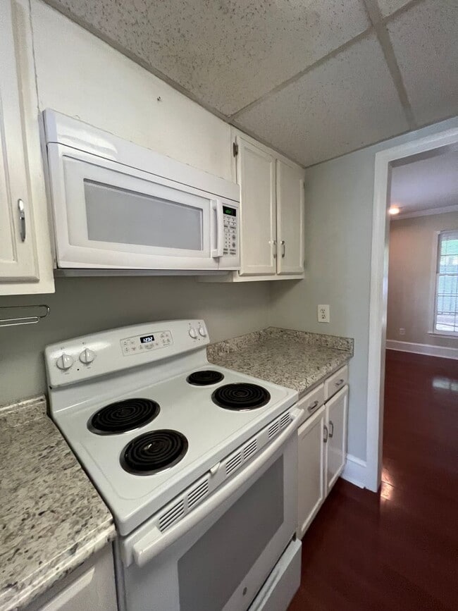 Building Photo - RENT SPECIAL! Just painted, modern gray! Charming end unit town home in Stones Throw. Walking dis...