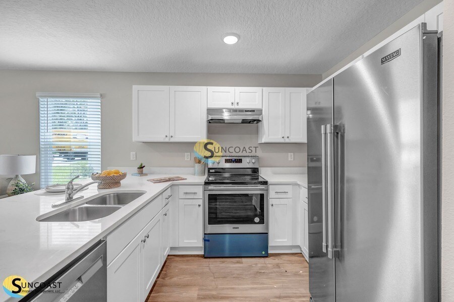 Foto principal - 6499 Breezy Oaks Wy