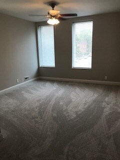 First bedroom with new carpet, three large windows, walk in closet - 2126 Withnell Ave