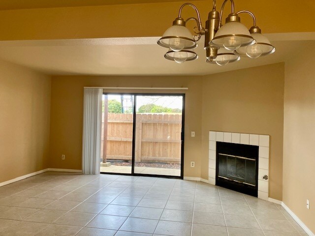 Current photo. Gas fireplace, outdoor area. - 58 Village Cir Dr