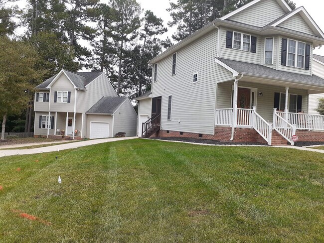 Building Photo - 220 Whistling Swan Dr