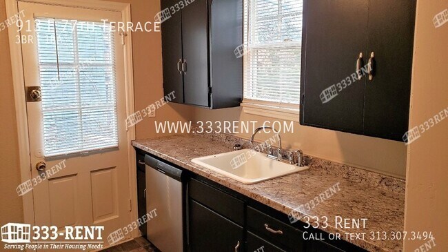 Foto del edificio - 913 E 77th Terrace