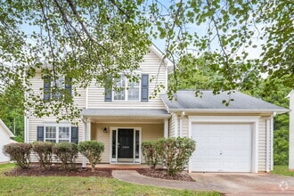 Building Photo - 5209 Carriage Woods Dr