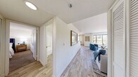 Located at 1770 N Green Valley Pkwy in Las Vegas, NV, this thoughtfully designed one-bedroom residence offers a comfortable and functional single-floor layout. The living room serves as the heart of the home, anchored by a classic fireplace and bathed in natural light from large windows with views of the surrounding landscape. Light wood-style flooring runs throughout the main living areas, adding warmth and continuity to the space.

The adjacent dining area is bright and inviting, featuring a ceiling fan and generous window coverage that frames pleasant outdoor views, making it an ideal spot for everyday meals. The kitchen is well-equipped with rich warm-toned cabinetry, granite-style countertops, a full suite of black appliances including a gas range, built-in microwave, dishwasher, and refrigerator, all complemented by light wood flooring.

The bedroom offers a cozy retreat with plush carpeting, a large window dressed with elegant navy curtains, and ample natural light. A dedicated closet provides convenient storage. The clean, neutral color palette throughout the residence creates a calm and welcoming ambiance, making this a practical and comfortable home in the heart of the Las Vegas valley.