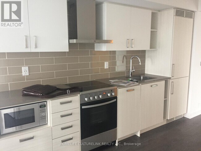 Photo du bâtiment - 125 Redpath Ave