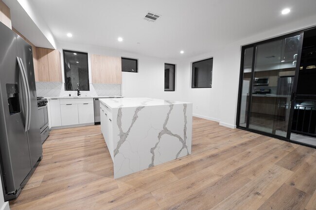 Kitchen with family room - 1933 N Vista del Mar Ave
