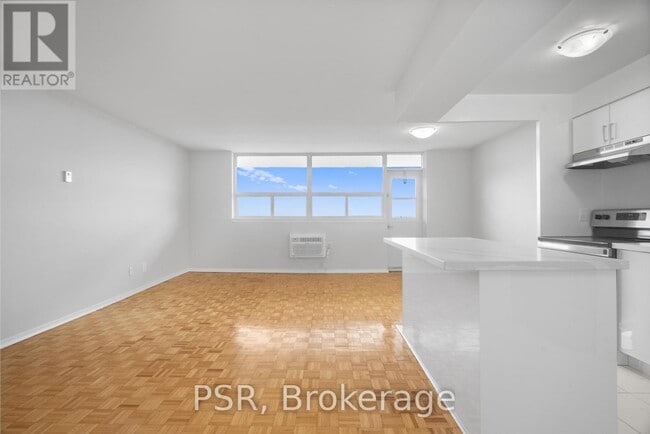 Building Photo - 111-2111 Raglan Ave