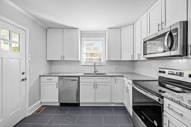 Photo - "2-Bed Bungalow with Granite Touches & Gleaming Hardwoods in Durham!" Apartment