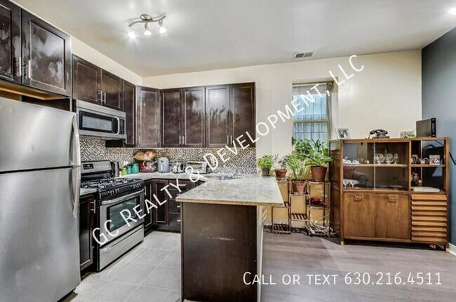 Foto del edificio - 1423 W Oakdale-Unit G