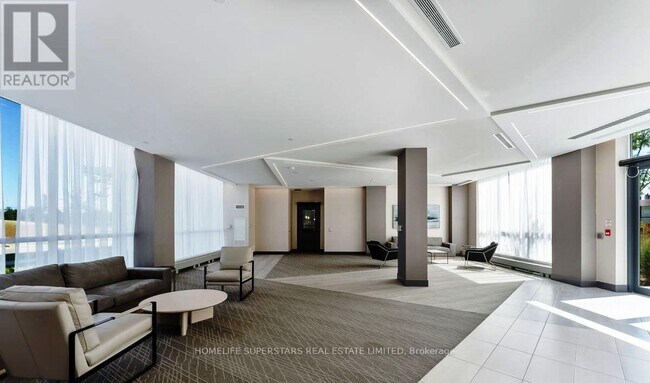 Photo du bâtiment - 415-415 Sea Ray Ave