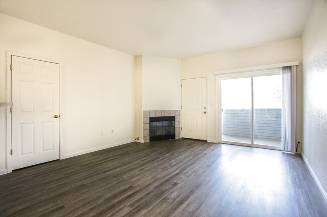Living Room - Large Pantry, Gas Fireplace & Access to Patio - 911 S Zeno Way