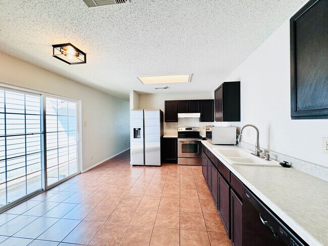 Building Photo - Discover Your Dream Haven: A Stylish Retre...