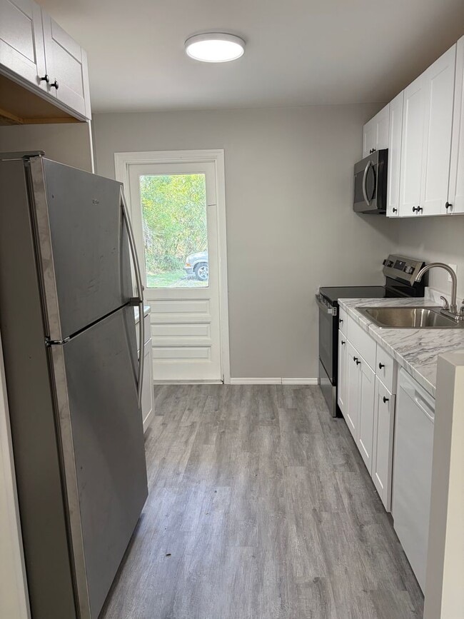 Photo - Newly Renovated 2 Bedroom Duplex in Maitland Available Now! Modern Finishes! House