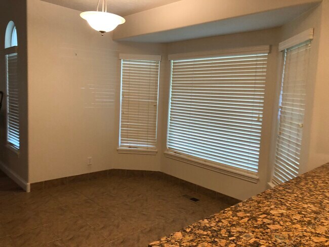 Building Photo - 5927 S Wallflower Pl