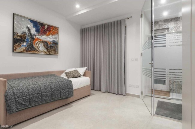 Foto del edificio - 3 br, 2 bath Condo - 818 W 223rd St Unit 2