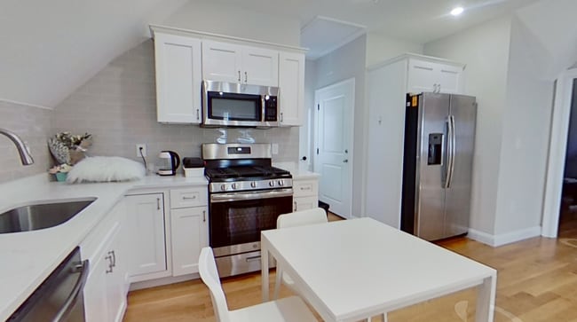 Photo - Avl now - No Fee! Renovated 3BR/2BA w/laundry in unit Apartment