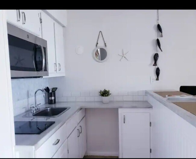 Building Photo - 3938 Surfside Blvd