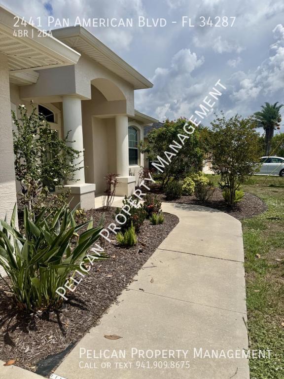 Building Photo - 2441 Pan American Blvd
