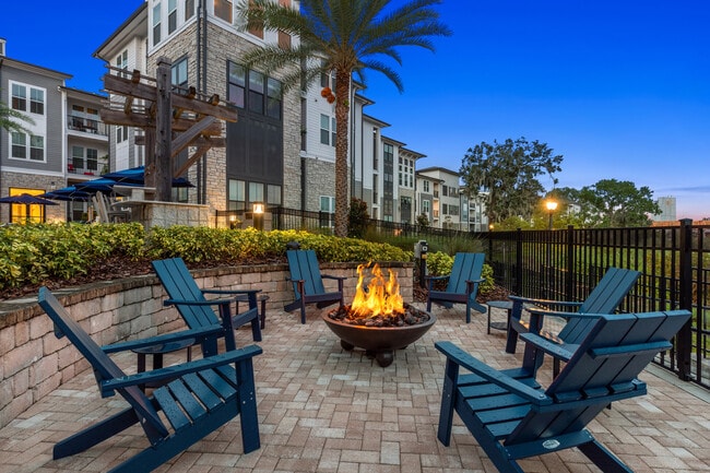 A fireside setting designed for relaxation and connection - The Adeline