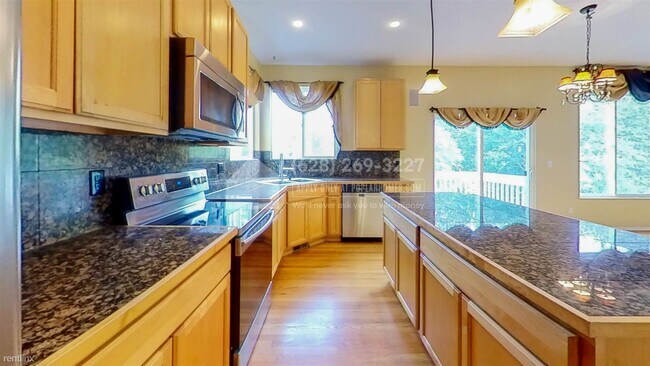Foto del edificio - 4 br, 2.5 bath House - 5111 110th St SE -