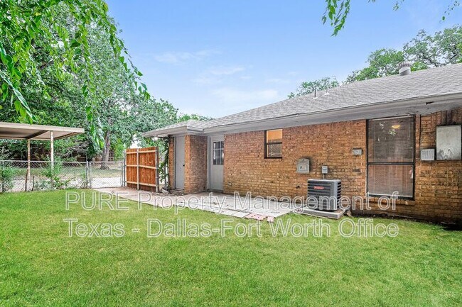 Foto del edificio - 7527 Windhaven Rd