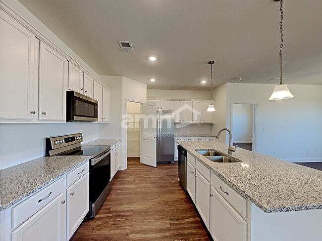 Foto del edificio - 7072 Creeksong Dr