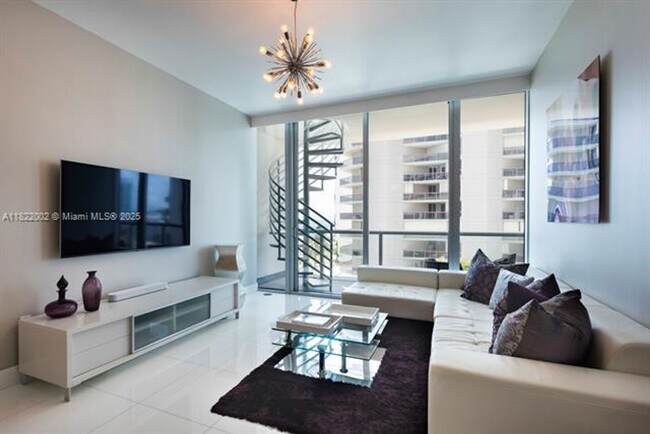 Building Photo - 6799 Collins Ave