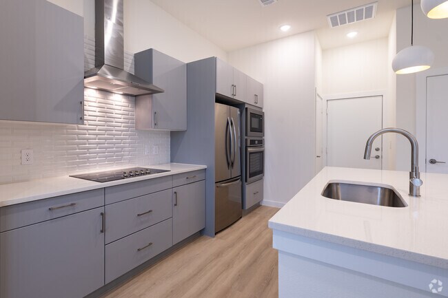 1 habitación, 1,5 baños - 812 pies cuadrados - Cocina - Oasis at Magnolia