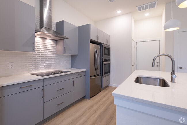 1BR, 1.5BA - 812SF - Kitchen - Oasis at Woodland